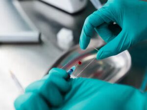 A lab technician preparing a blood sample.